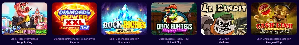 Row of slot game thumbnails showing Crack More Piggy Banks, Diamonds Power XXL Hold and Win 3x5, Rock & Riches Hold & Win, Duck Hunters Happy Hour, Le Bandit, and Cash Link Express Hold & Win.