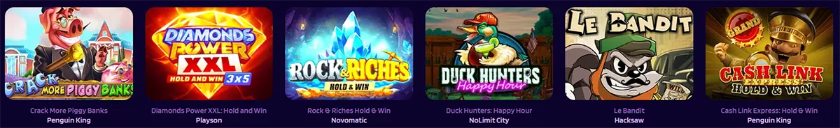 Row of slot game thumbnails showing Crack More Piggy Banks, Diamonds Power XXL Hold and Win 3x5, Rock & Riches Hold & Win, Duck Hunters Happy Hour, Le Bandit, and Cash Link Express Hold & Win.